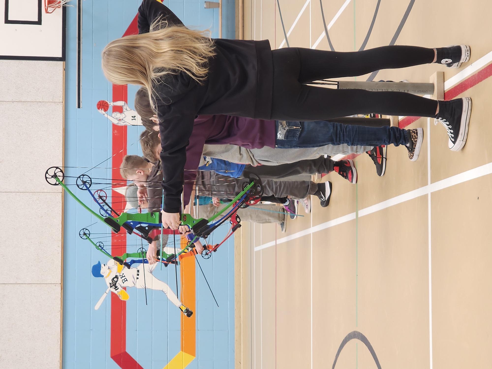 A picture containing archery</p>
<p>Description automatically generated